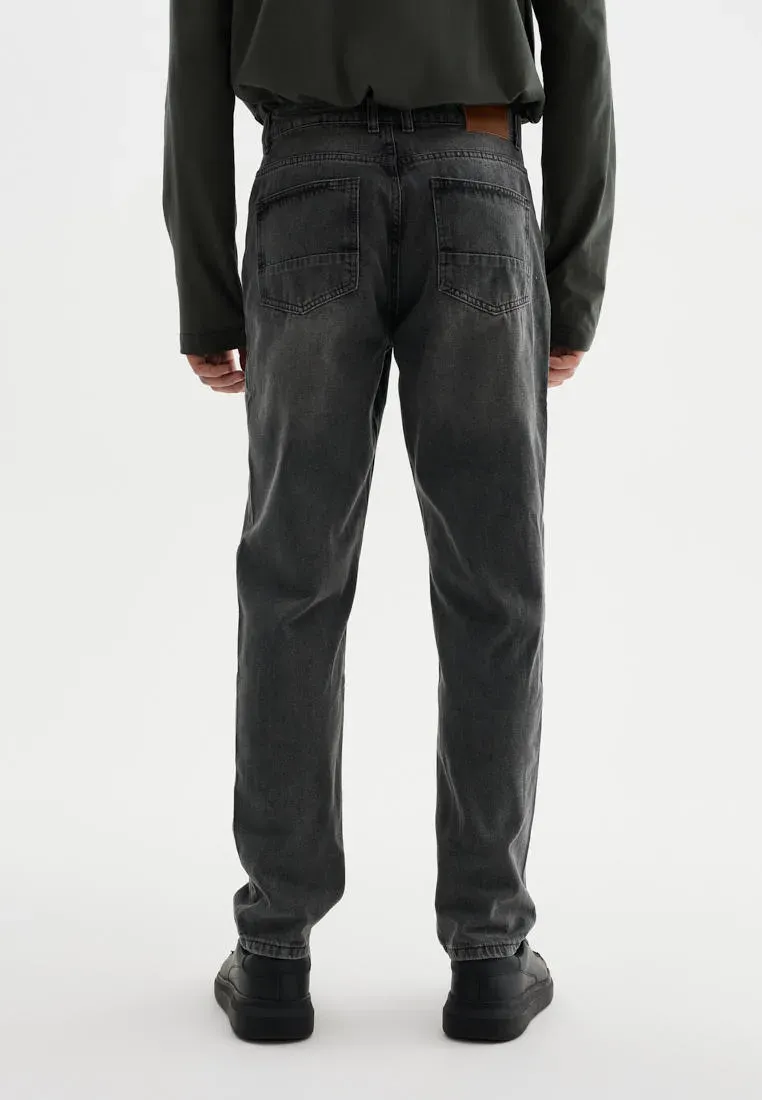 Джинсы Tapered fit