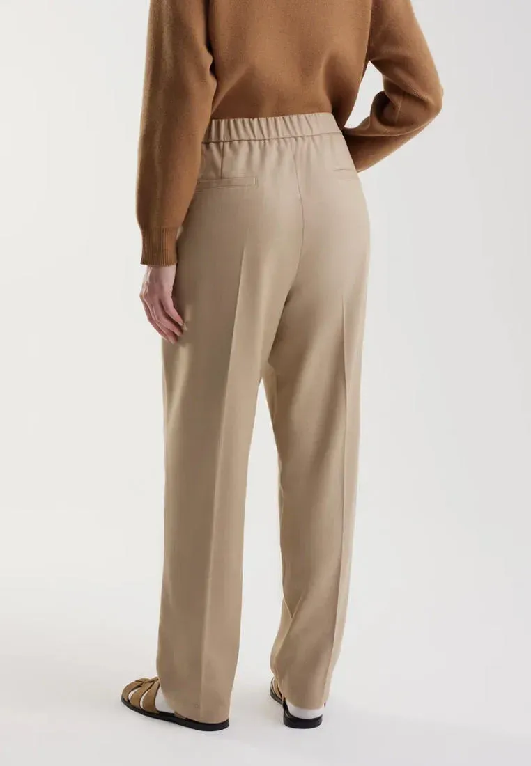 Прямые брюки со стрелками и защипами